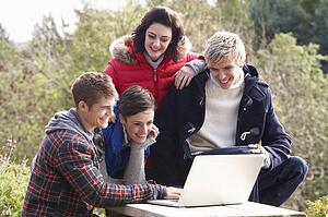 Students with laptop computer