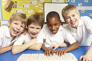 Schoolchildren in IT Class Using Computers