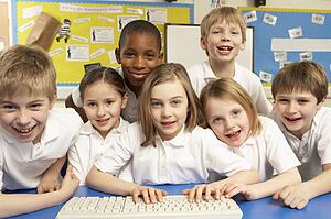 Schoolchildren in IT Class Using Computers