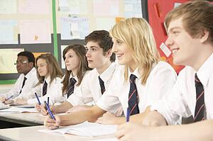 Teenage Students Studying In Classroom
