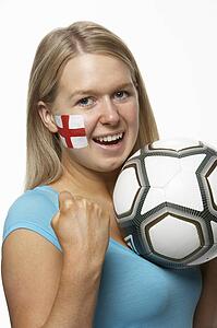 Young Female Sports Fan With St Georges Flag Painted On Face