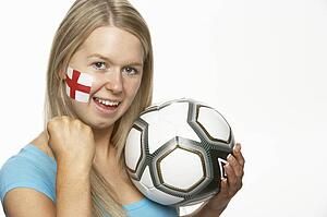 Young Female Football Fan With St Georges Flag Painted On Face