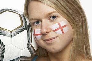 Young Female Football Fan With St Georges Flag Painted On Face