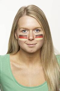 Young Female Sports Fan With German Flag Painted On Face
