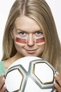 Young Female Sports Fan With German Flag Painted On Face