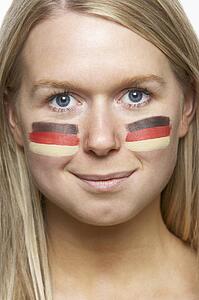 Young Female Sports Fan With German Flag Painted On Face