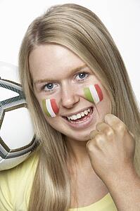Young Female Sports Fan With Italian Flag Painted On Face