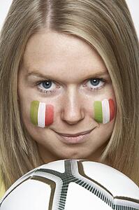 Young Female Sports Fan With Italian Flag Painted On Face