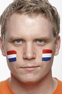 Young Male Sports Fan With Dutch Flag Painted On Face