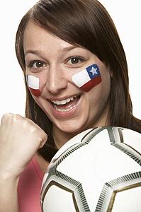 Young Female Football Fan With Chilean Flag Painted On Face
