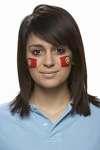 Young Female Sports Fan With Portugese Flag Painted On Face