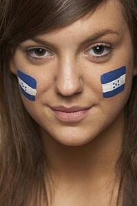 Young Female Sports Fan With Honduran Flag Painted On Face