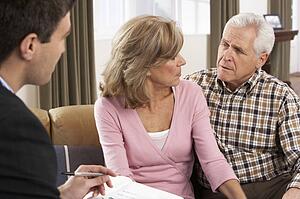 Senior Couple Talking With Financial Advisor
