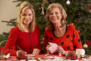Women Making Christmas Cards At Home