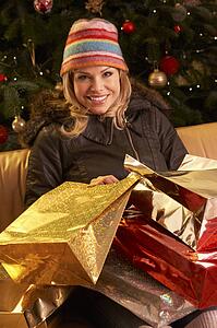 Woman Returning After Christmas Shopping Trip