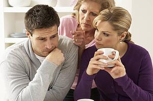 Senior Mother Interferring With Couple Having Argument At Home