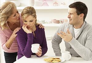 Senior Mother Interferring With Couple Having Argument At Home