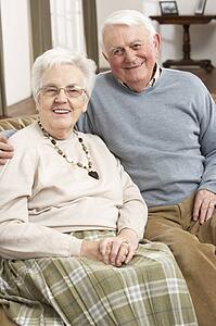 Portrait Of Happy Senior Couple At Home