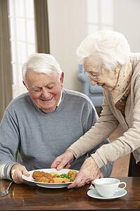 Senior Couple Enjoying Meal Together