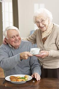 Senior Couple Enjoying Meal Together