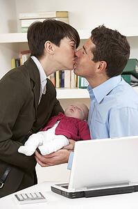 Working Mother Leaving Baby With Father Who Works From Home