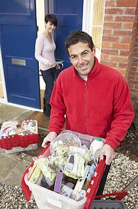 Home Delivery Grocery Driver Unloading Customer's Shopping
