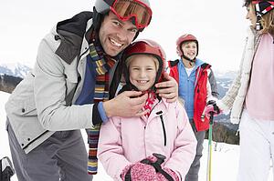 Young Family On Ski Vacation