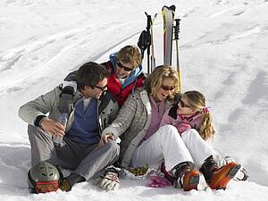 Young Family On Ski Vacation