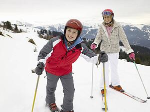 Young Mother And Son On Ski Vacation