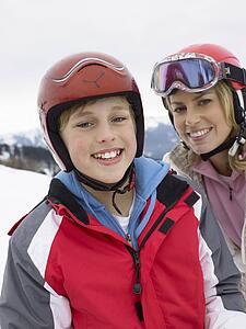 Young Mother And Son On Ski Vacation