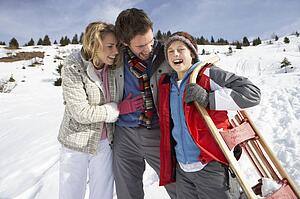 Young Family On Winter Vacation
