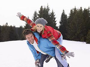 Young Woman In Alpine Snow Scene