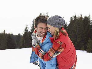 Young Woman In Alpine Snow Scene