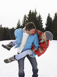 Young Woman In Alpine Snow Scene