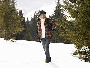 Young Man In Alpine Snow Scene