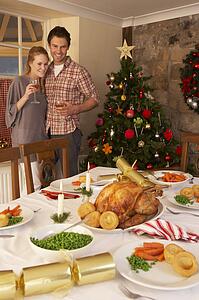 Young couple at home at Christmas