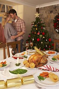 Young couple at home at Christmas