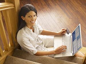 Young Hispanic woman shopping online