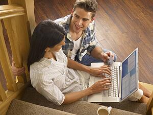 Young Hispanic couple shopping online