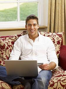 Young Hispanic couple shopping online