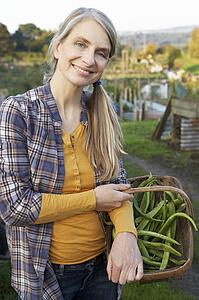 Woman working on allotment