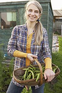 Woman working on allotment