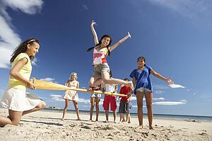 Teenagers having fun on beach