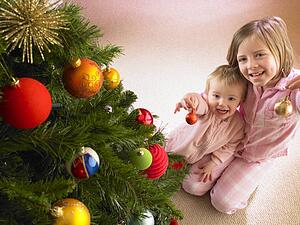 Children with Christmas tree