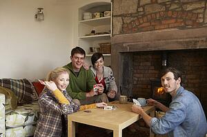 Young couples in cosy cottage