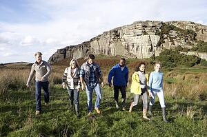 Young adults on country walk