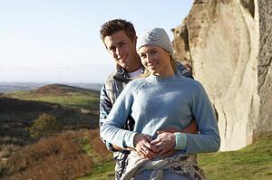 Young couple on country walk