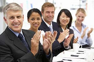 Business people clapping