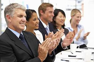 Business people clapping