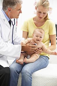 Pediatrician with baby